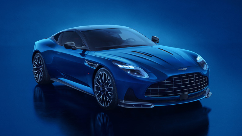 Front 3/4 view of a blue 2026 Aston Martin DB12 S