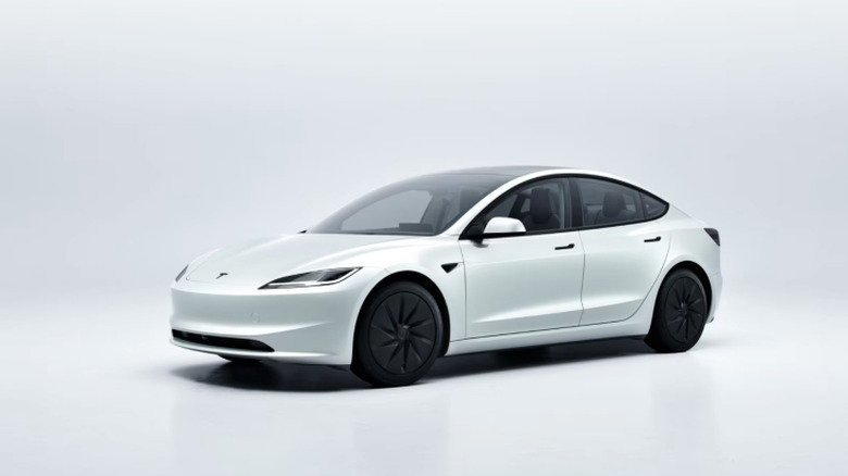 Front 3/4 view of a white Tesla Model 3 Standard